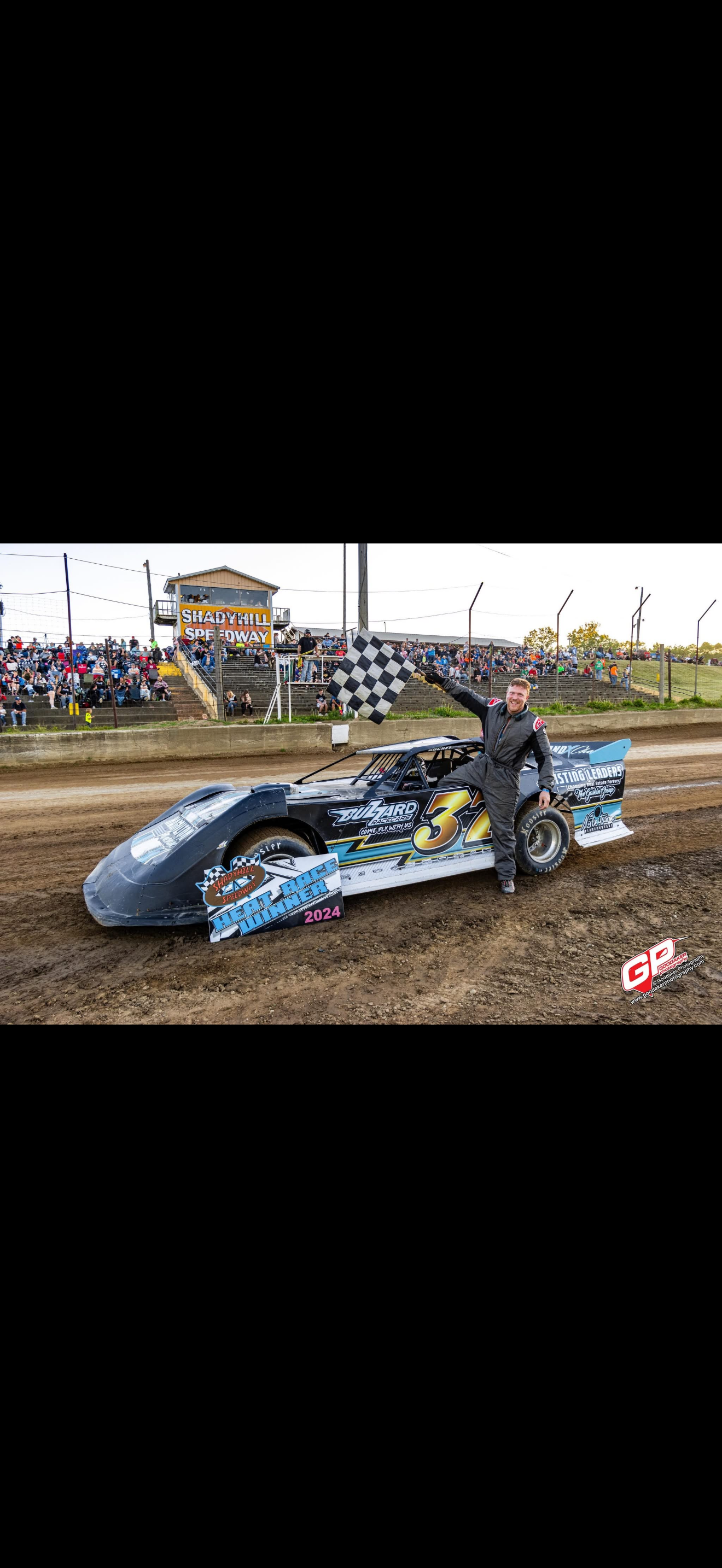Dirt track race car victory celebration