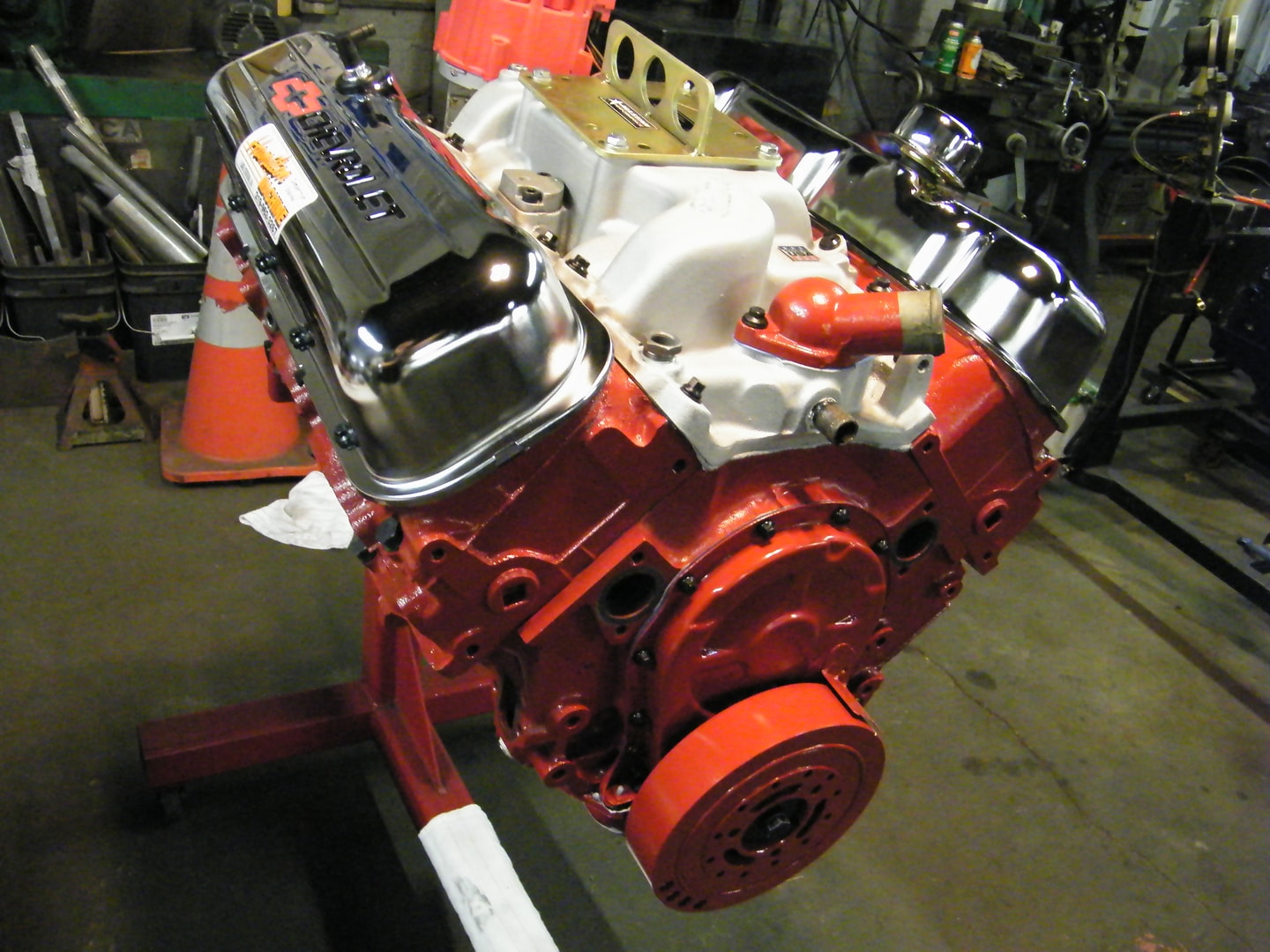Restored red engine block workshop display